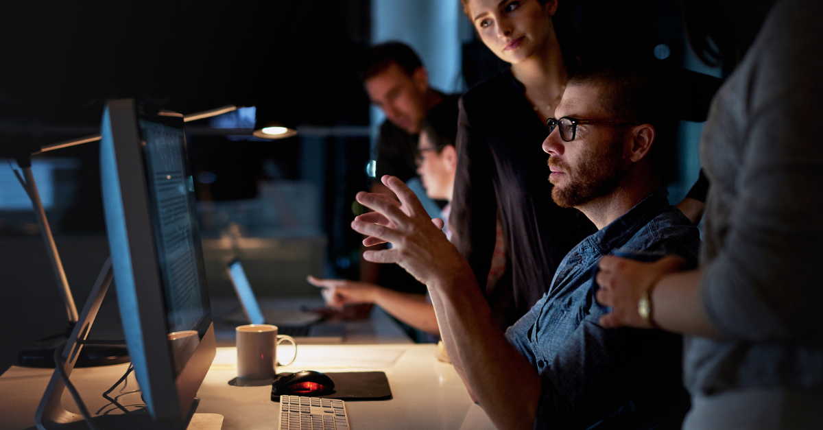 Team around computer