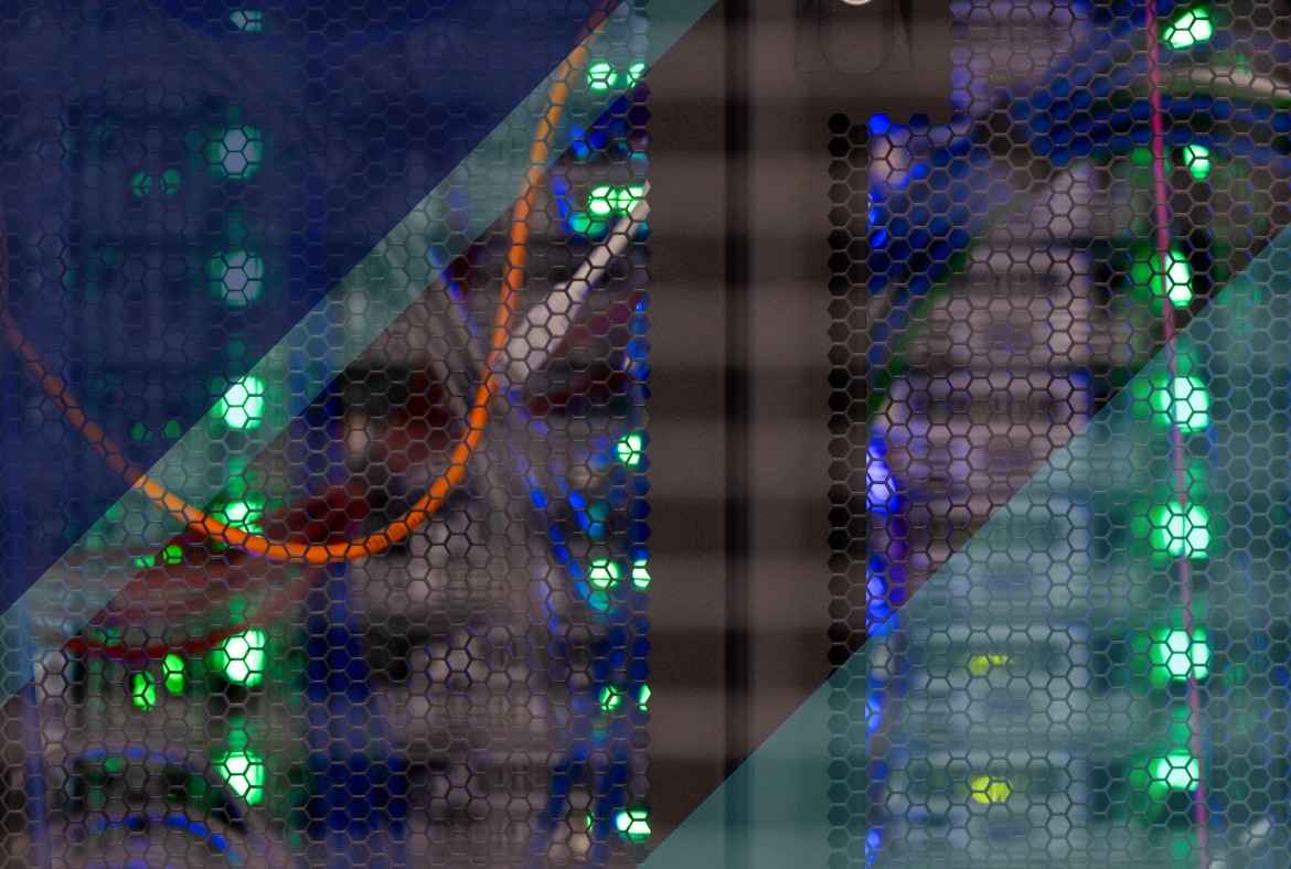 Server racks behind a perforated panel with network cables and green and blue status lights, indicating active cloud infrastructure