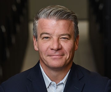 Chris Downie, Chief Executive Officer, Board Member