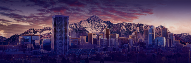 Denver cityscape with rocky mountains in background