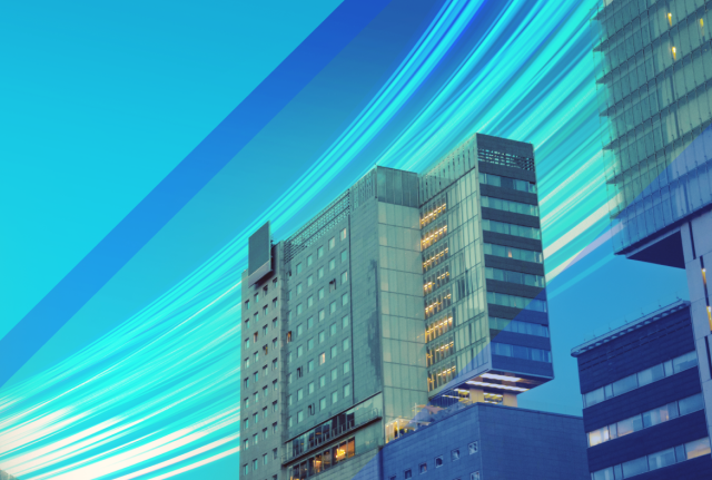 Modern high-rise building with illuminated windows and blue light trails, overlaid with geometric graphics suggesting high-performance computing and connectivity.
