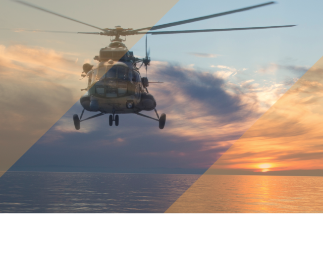 Helicopter flying over open water at sunset, with blue geometric overlays across the sky and horizon.